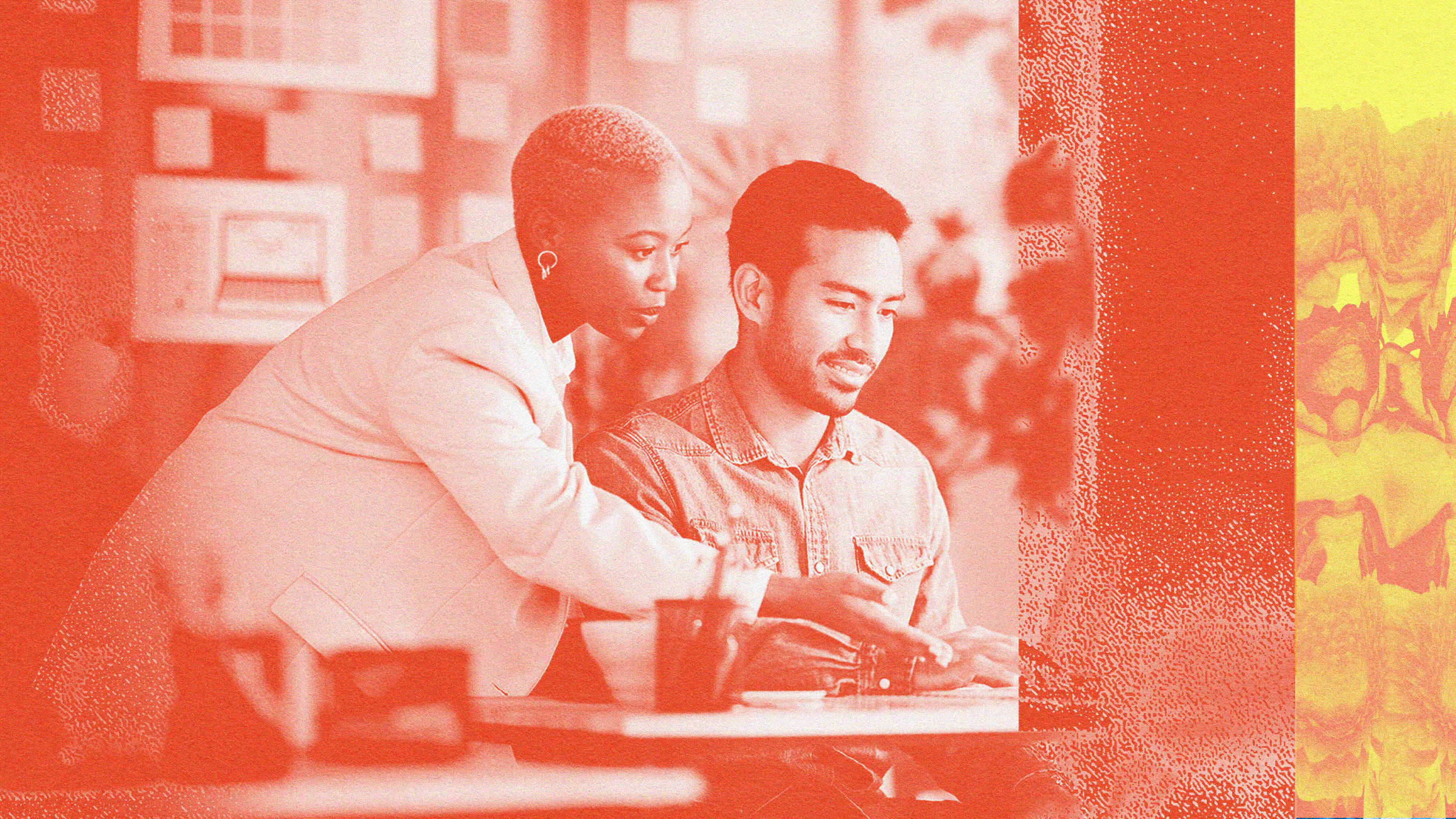 A man and woman demonstrating emotional intelligence while sitting at a table with a laptop.